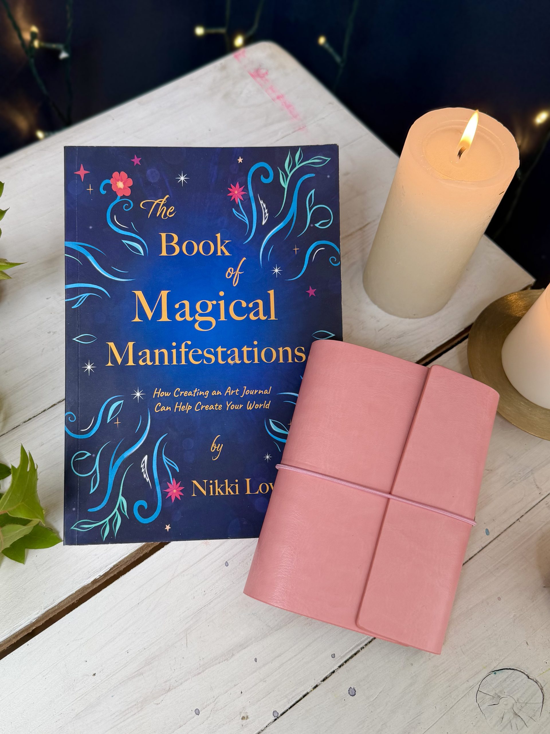 The Book of Magical Manifestations and a pink watercolour journal set